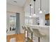 Bright and airy kitchen featuring a breakfast bar with pendant lighting and stainless steel appliances at 644 Serendipity Circle, Murrells Inlet, SC 29576