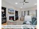 Spacious living room featuring a fireplace and large windows for abundant light at 644 Serendipity Circle, Murrells Inlet, SC 29576