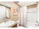 Well-lit bathroom featuring a tub and shower with a vanity at 6461 Norton Rd., Green Sea, SC 29545