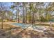 Enjoy outdoor recreation with the community shuffleboard court among the trees at 6644 E Sweetbriar Trail, Myrtle Beach, SC 29588