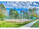 Enjoy a game on the community tennis courts, surrounded by mature trees and lush landscaping at 6644 E Sweetbriar Trail, Myrtle Beach, SC 29588