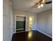 Bedroom with dark hardwood floors and closet at 703 Riverwalk Dr. # 103, Myrtle Beach, SC 29579