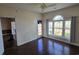 Bedroom with hardwood floors and access to patio at 703 Riverwalk Dr. # 103, Myrtle Beach, SC 29579