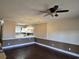 Open dining area with kitchen access and hardwood floors at 703 Riverwalk Dr. # 103, Myrtle Beach, SC 29579