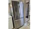 Stainless steel refrigerator in kitchen at 703 Riverwalk Dr. # 103, Myrtle Beach, SC 29579