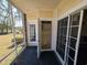 Screened porch with storage and sliding glass doors at 703 Riverwalk Dr. # 103, Myrtle Beach, SC 29579