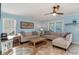 Cozy living room with comfortable seating and natural light at 719 N Waccamaw Dr., Garden City Beach, SC 29576