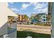 Coastal home with beautiful street view and palm trees at 719 N Waccamaw Dr., Garden City Beach, SC 29576