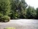 Gravel parking pad in the front provides plenty of room for Gathering and friends to visit at 76 Nailah Ln., Pawleys Island, SC 29585