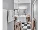 Bathroom with a double vanity and checkered floors at 799 Helms Way, Conway, SC 29526