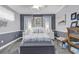 Bedroom with a queen bed and gray color scheme at 799 Helms Way, Conway, SC 29526