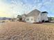 Wide view of backyard of house with bright siding at 8304 Parasol Ct., Myrtle Beach, SC 29579