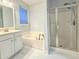 Bathroom featuring a soaking tub, enclosed shower, and vanity at 8304 Parasol Ct., Myrtle Beach, SC 29579