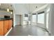 Bright dining area features built-in desk, windows, and open layout to kitchen at 8304 Parasol Ct., Myrtle Beach, SC 29579