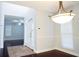 Bright foyer with hardwood floors and a decorative light fixture at 8304 Parasol Ct., Myrtle Beach, SC 29579