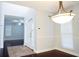 Elegant foyer featuring hardwood floors, a stylish chandelier, and a welcoming atmosphere, leading to other rooms at 8304 Parasol Ct., Myrtle Beach, SC 29579
