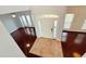 Inviting foyer boasts hardwood floors, a stylish front door, and an abundance of natural light at 8304 Parasol Ct., Myrtle Beach, SC 29579