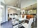 Open-concept living and dining area featuring hardwood floors and access to the kitchen at 8304 Parasol Ct., Myrtle Beach, SC 29579