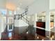 Open-concept living area boasts hardwood floors, high ceilings, and plenty of natural light at 8304 Parasol Ct., Myrtle Beach, SC 29579