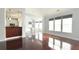 Bright living room featuring hardwood floors, multiple windows, and an open layout at 8304 Parasol Ct., Myrtle Beach, SC 29579