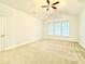 Spacious main bedroom with vaulted ceilings and three bright windows at 8304 Parasol Ct., Myrtle Beach, SC 29579