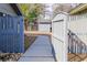 Fenced backyard with a well-maintained yard and storage shed at 908 Cedarwood Circle, Myrtle Beach, SC 29572