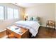 Cozy bedroom with hardwood floors, bright windows, and a decorative chest at 908 Cedarwood Circle, Myrtle Beach, SC 29572