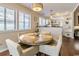 Dining area with wood table, chairs, and view to kitchen at 908 Cedarwood Circle, Myrtle Beach, SC 29572