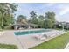 Community pool with shaded seating area, offering a great place to relax at 908 Cedarwood Circle, Myrtle Beach, SC 29572