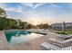 Outdoor community pool with lounge chairs and picnic benches at 908 Cedarwood Circle, Myrtle Beach, SC 29572