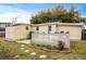 Cozy backyard with a small patio, perfect for relaxing and outdoor entertaining at 913 S Dogwood Dr. S, Surfside Beach, SC 29575