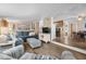 Cozy living room seamlessly connects to the dining area and kitchen, creating an open and inviting space at 913 S Dogwood Dr. S, Surfside Beach, SC 29575