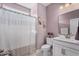 Bathroom featuring a decorative shower curtain, a vanity with storage, and a decorative mirror at 931 Desert Wheatgrass Dr., Myrtle Beach, SC 29579