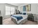 Comfortable bedroom featuring a plush armchair, a decorative throw pillow, and neutral-colored carpeting at 931 Desert Wheatgrass Dr., Myrtle Beach, SC 29579