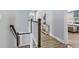 Upstairs hallway with wood floors, wainscoting and access to the bedroom at 931 Desert Wheatgrass Dr., Myrtle Beach, SC 29579