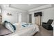 Main bedroom features gray walls, a TV, and an accent chair at 931 Desert Wheatgrass Dr., Myrtle Beach, SC 29579