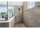 Spacious tiled walk-in shower featuring decorative tile accents, and a frosted glass divider panel at 931 Desert Wheatgrass Dr., Myrtle Beach, SC 29579