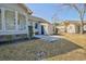 Backyard featuring a small patio, landscaping, and shed at 9450 Old Palmetto Rd., Murrells Inlet, SC 29576