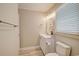 Updated bathroom featuring a modern vanity, updated fixtures, and a large mirror at 9450 Old Palmetto Rd., Murrells Inlet, SC 29576