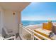 Relaxing balcony view featuring ocean scenery and comfortable seating, perfect for enjoying the coastal breeze at 1207 S Ocean Blvd. # 51305, Myrtle Beach, SC 29577