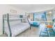 Inviting bedroom featuring bunk beds, queen bed, and balcony access at 1207 S Ocean Blvd. # 51305, Myrtle Beach, SC 29577