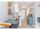 Kitchen with white appliances, breakfast bar, and unique tile floors at 1207 S Ocean Blvd. # 51305, Myrtle Beach, SC 29577
