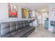 Cozy living room and kitchen with couch, breakfast bar and modern appliances at 1207 S Ocean Blvd. # 51305, Myrtle Beach, SC 29577
