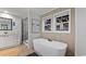 Stylish bathroom featuring a freestanding tub, modern vanity, and a walk-in shower at 123 Forman Way, Aynor, SC 29511