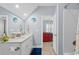 Bathroom featuring double sinks, marble countertops, and soft, neutral walls at 129 Marblehead Dr., Little River, SC 29566