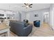 Open floor plan showing the living room, kitchen, and dining area with hardwood floors and neutral walls at 129 Marblehead Dr., Little River, SC 29566