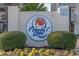 Marlin Quay community entrance sign is surrounded by manicured shrubbery and flower beds at 1398 Basin Dr. # 111, Murrells Inlet, SC 29576