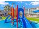 Colorful playground adjacent to manicured lawns and comfortable access to condominium amenities at 14300 Ocean Hwy. # 205, Pawleys Island, SC 29585