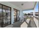 Inviting balcony area with rocking chairs, offering a relaxing outdoor space with neighborhood views at 1510 S Ocean Blvd. # 101, Surfside Beach, SC 29575