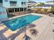 Beautiful in-ground pool surrounded by a fence and palm trees for the perfect view at 1510 S Ocean Blvd. # 101, Surfside Beach, SC 29575